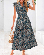 Dámské boho midi šaty Juliet – květinový vzor s výstřihem do V, volány a bočními kapsami