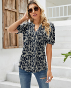Hazel Top Donna – Bluză tunică florală cu decolteu în V, mâneci bufante și pliuri
