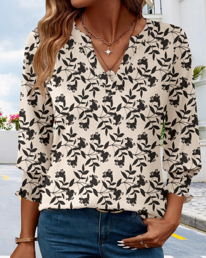 Tessa – Damska bluzka z dekoltem w serek, rękawami 3/4 i miękkim krojem babydoll