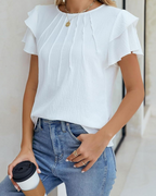 Ruby Blusa Damska – Elegancki top plisowany z falbanianymi rękawami i złotą klamrą