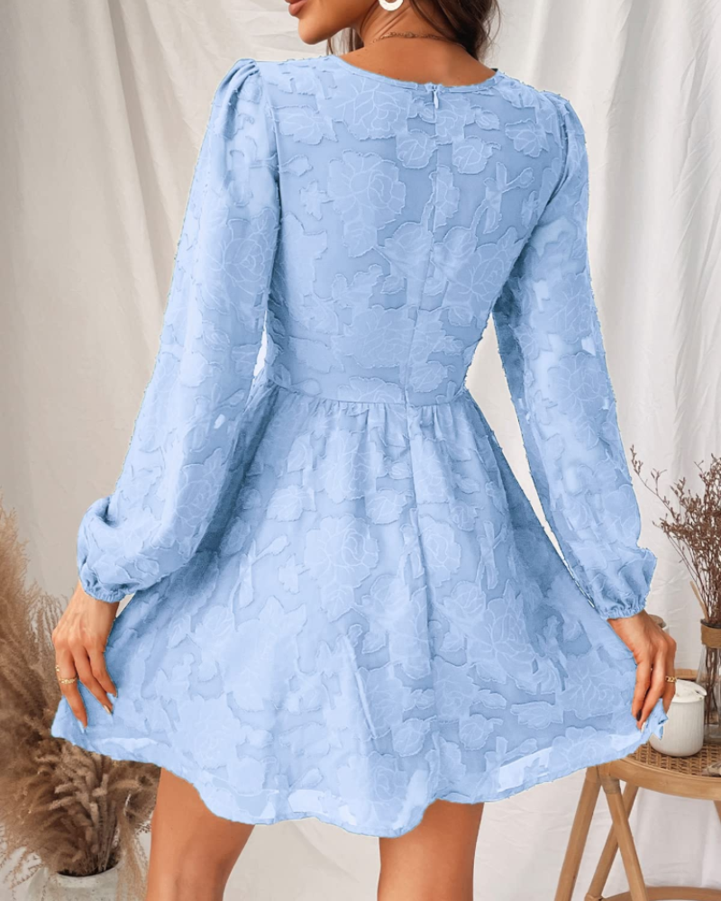 Olivia Abito Donna – Mini kjole med blomsterprint, V-hals, lange ermer og A-linje