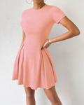 Megan Abito Donna – Mini bodycon-kjole med høy midje, plissért skjørt og korte ermer