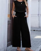 Salopetă elegantă pentru femei Maren – dantelă, talie cu șnur și pantaloni largi cu buzunare